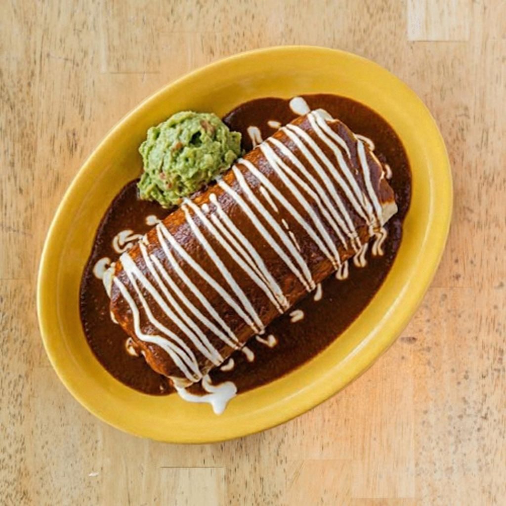 Smother any burrito.(Verde, Rojo, Mole or Cheese sauce).
